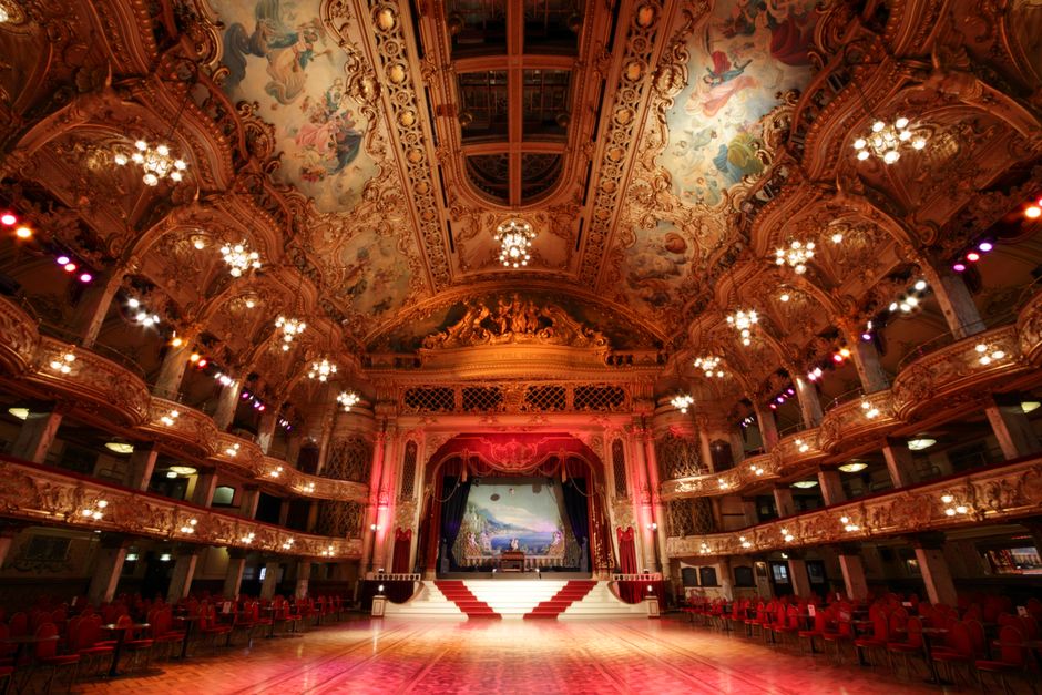 Stunning view of the historic Blackpool Tower Ballroom's ornate interior with elegant chandeliers and detailed ceiling artwork.